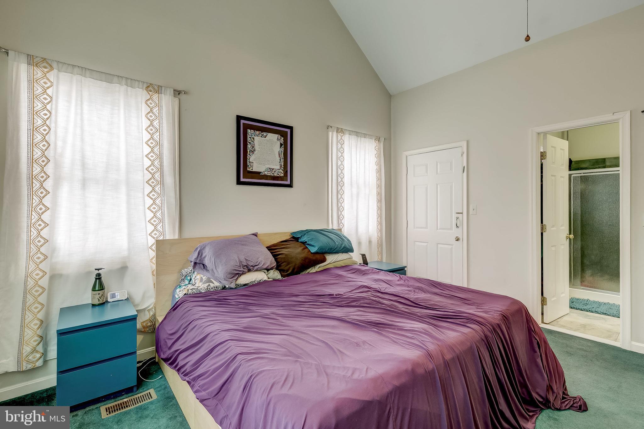 2416 Steele Road Baltimore, MD 21209 - Photo 21 of 47 a bedroom with a bed and a window