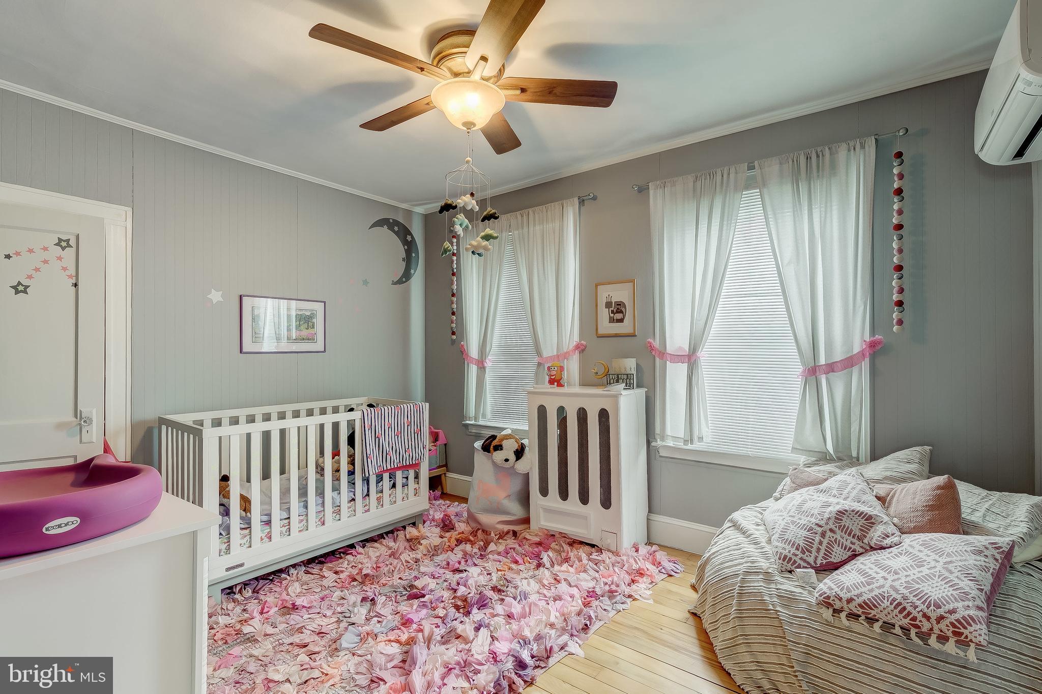 2416 Steele Road Baltimore, MD 21209 - Photo 27 of 47 a bedroom with a bed and a window