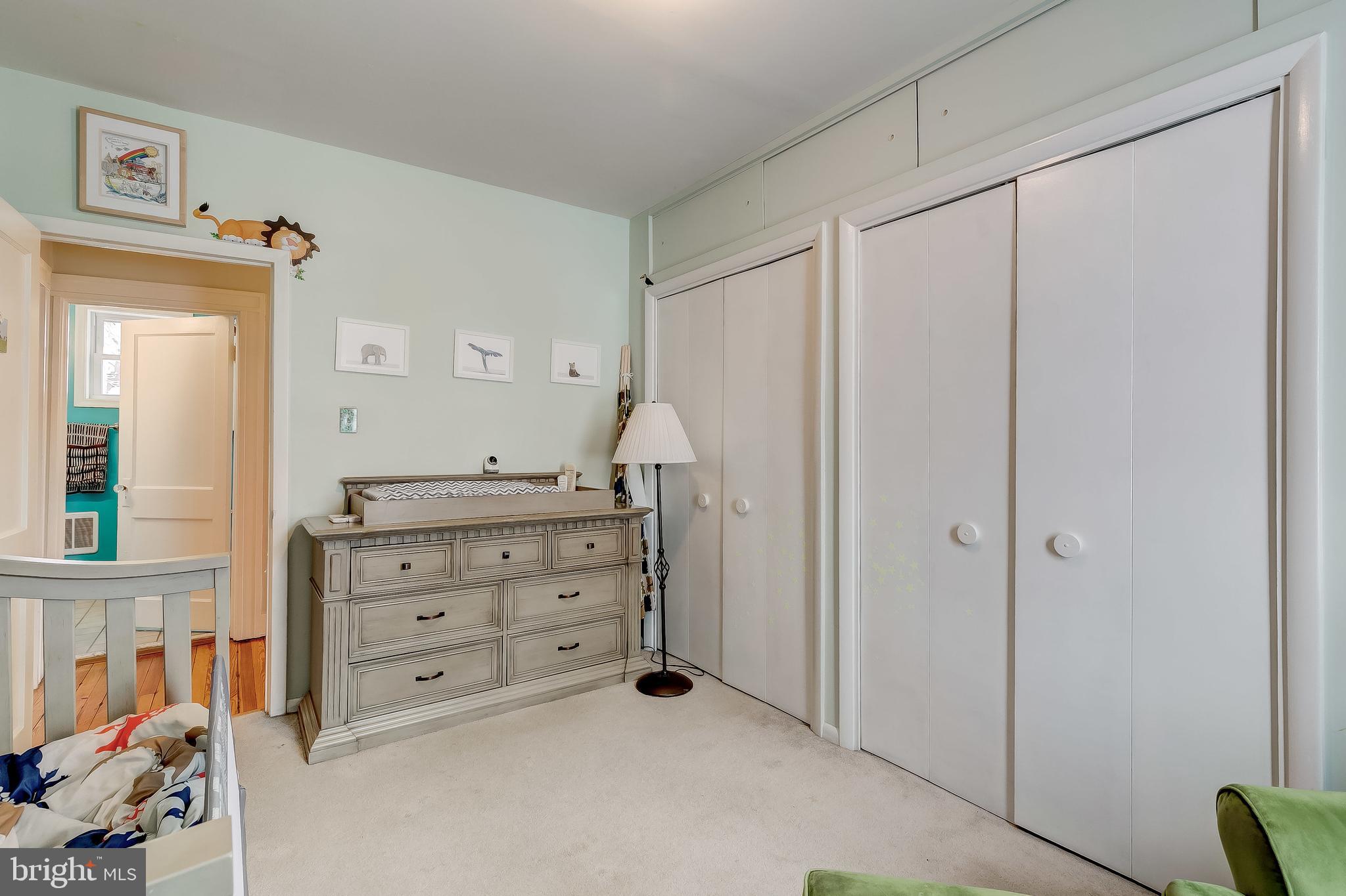 2416 Steele Road Baltimore, MD 21209 - Photo 31 of 47 a room with a dresser and a mirror