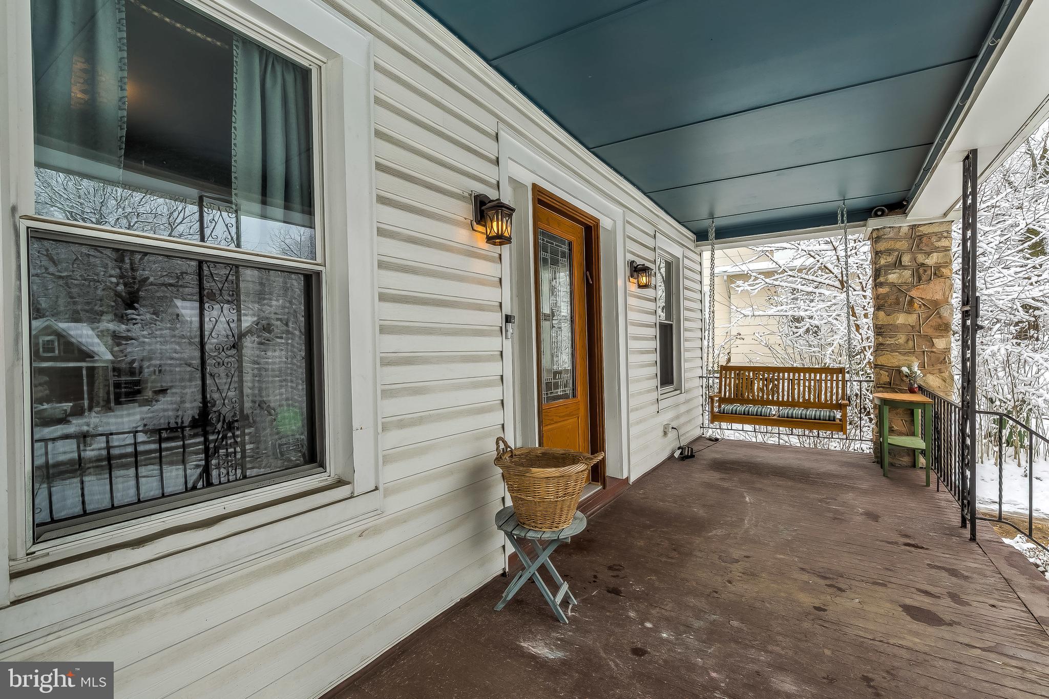 2416 Steele Road Baltimore, MD 21209 - Photo 35 of 47 a view of a porch with wooden floor and outdoor space