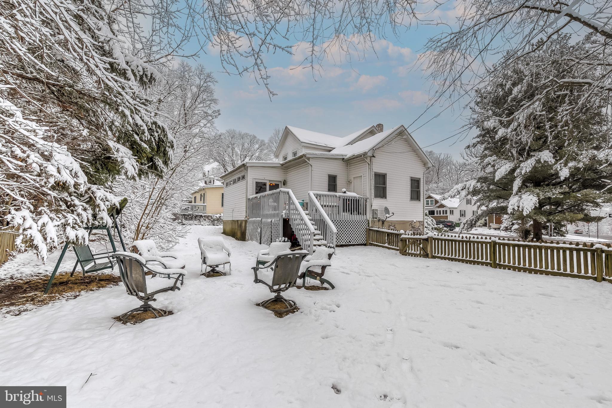 2416 Steele Road Baltimore, MD 21209 - Photo 46 of 47 a view of a house with a yard and sitting area