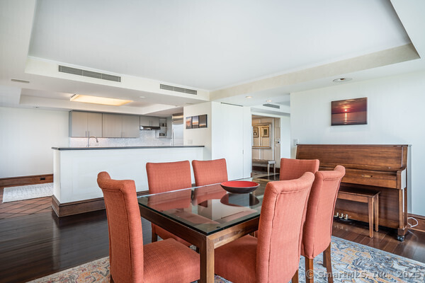 1 Gold Street, Unit 14ABC Hartford, CT 06103 - Photo 13 of 37 a view of a dining room with furniture