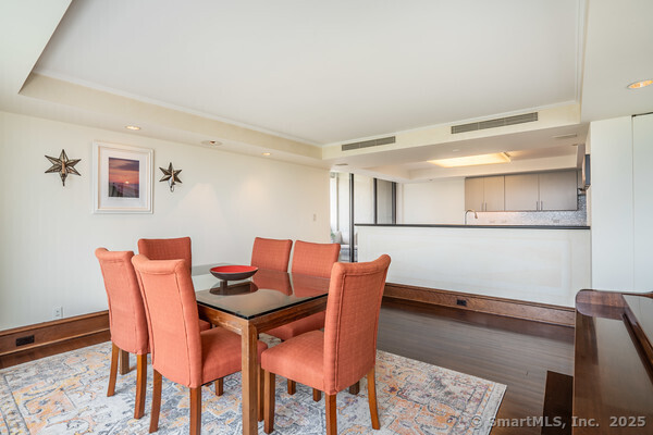 1 Gold Street, Unit 14ABC Hartford, CT 06103 - Photo 14 of 37 a dining room with furniture and wooden floor