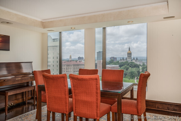 1 Gold Street, Unit 14ABC Hartford, CT 06103 - Photo 15 of 37 a view of a dining room with furniture window and outside view