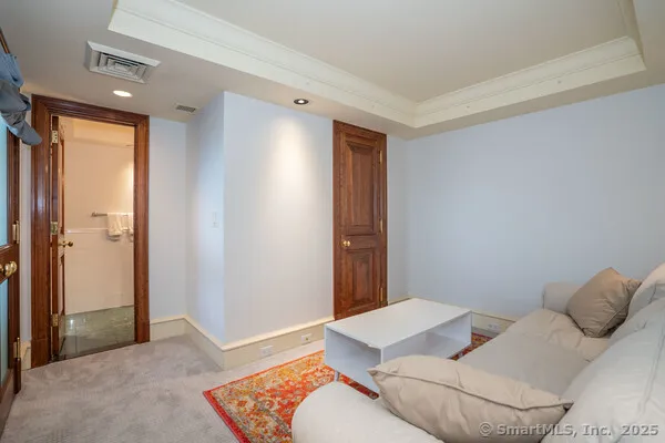 a bedroom with a bed and a cabinets