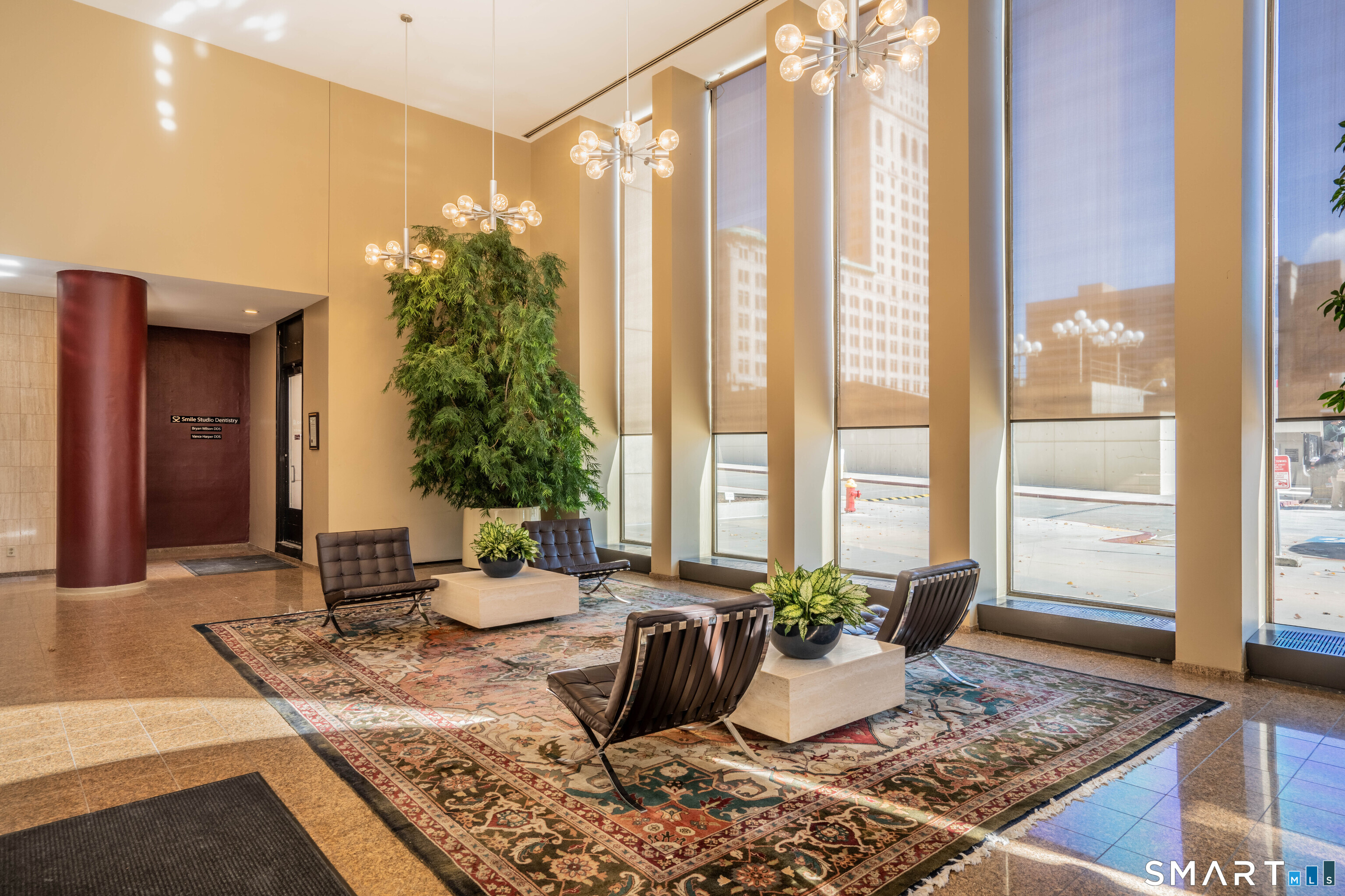 1 Gold Street, Unit 14ABC Hartford, CT 06103 - Photo 4 of 37 a dining room with table and chair