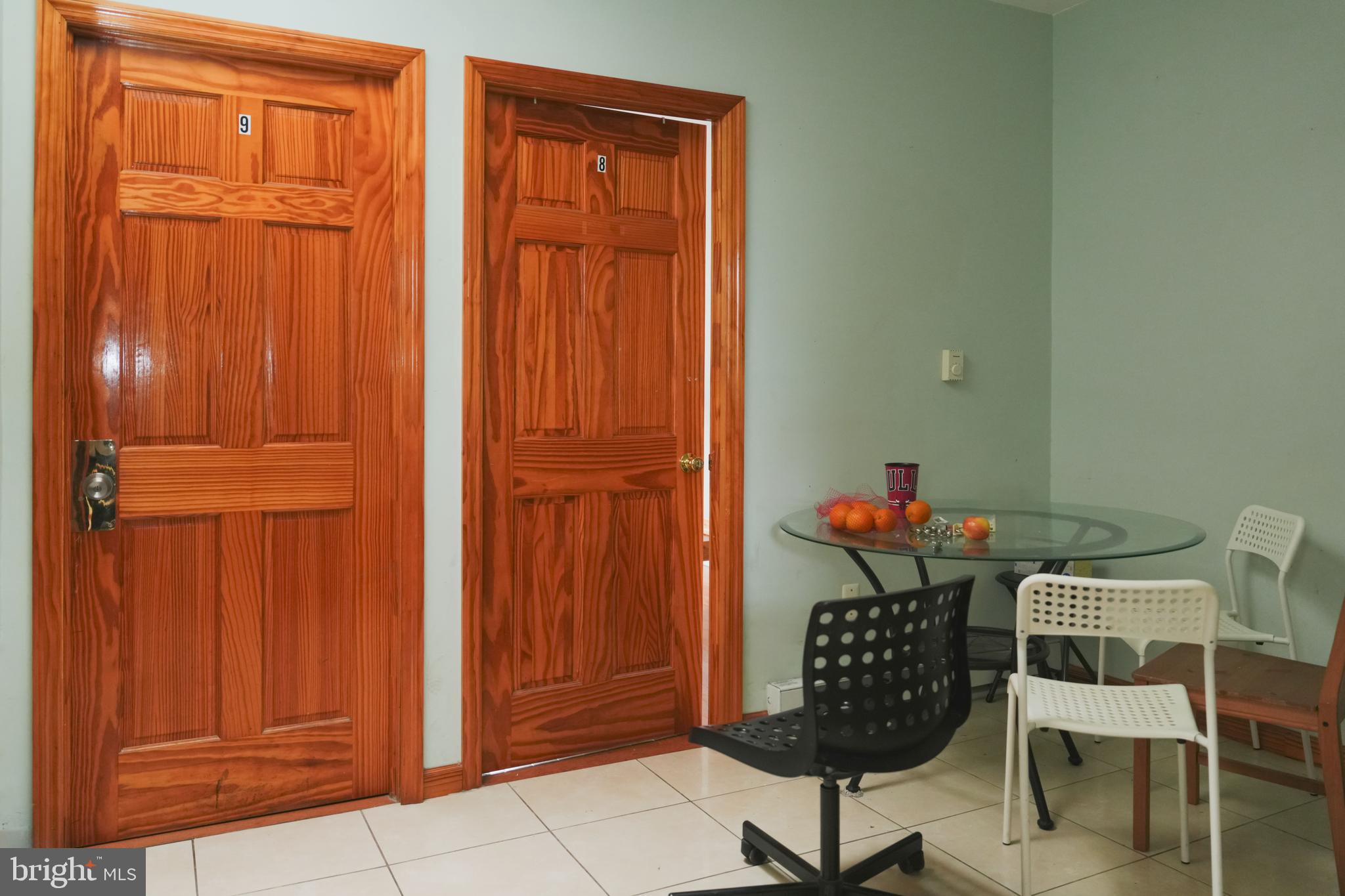 222 South 43rd Street, Unit 3 Philadelphia, PA 19104 - Photo 12 of 14 a table chair in a room