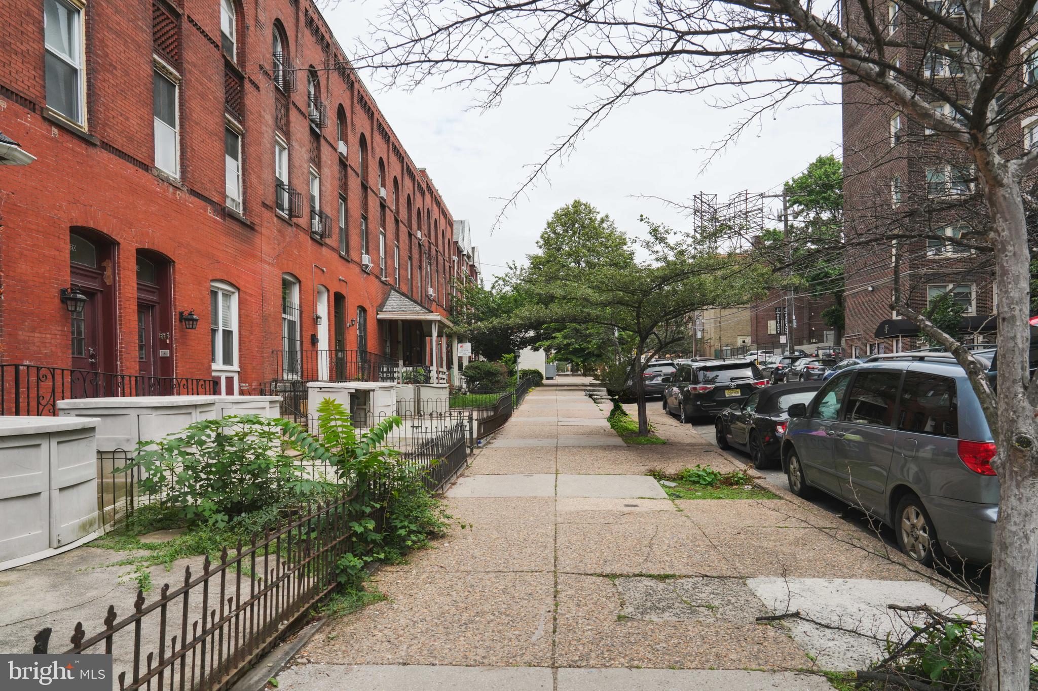 222 South 43rd Street, Unit 3 Philadelphia, PA 19104 - Photo 3 of 14 a view of a building with car parked