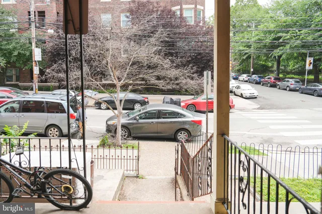 a car parked in front of a building