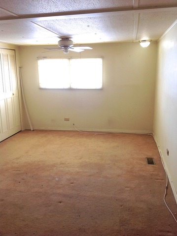 1104 Candida Road Elgin, IL 60123 - Photo 14 of 25 an empty room with a empty space and a window