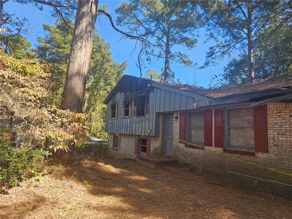 2835 Randy Court Ellenwood, GA 30294 - Photo 2 of 7 a front view of a house with a yard