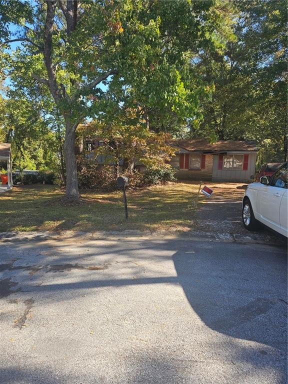 2835 Randy Court Ellenwood, GA 30294 - Photo 4 of 7 a view of a yard with a tree