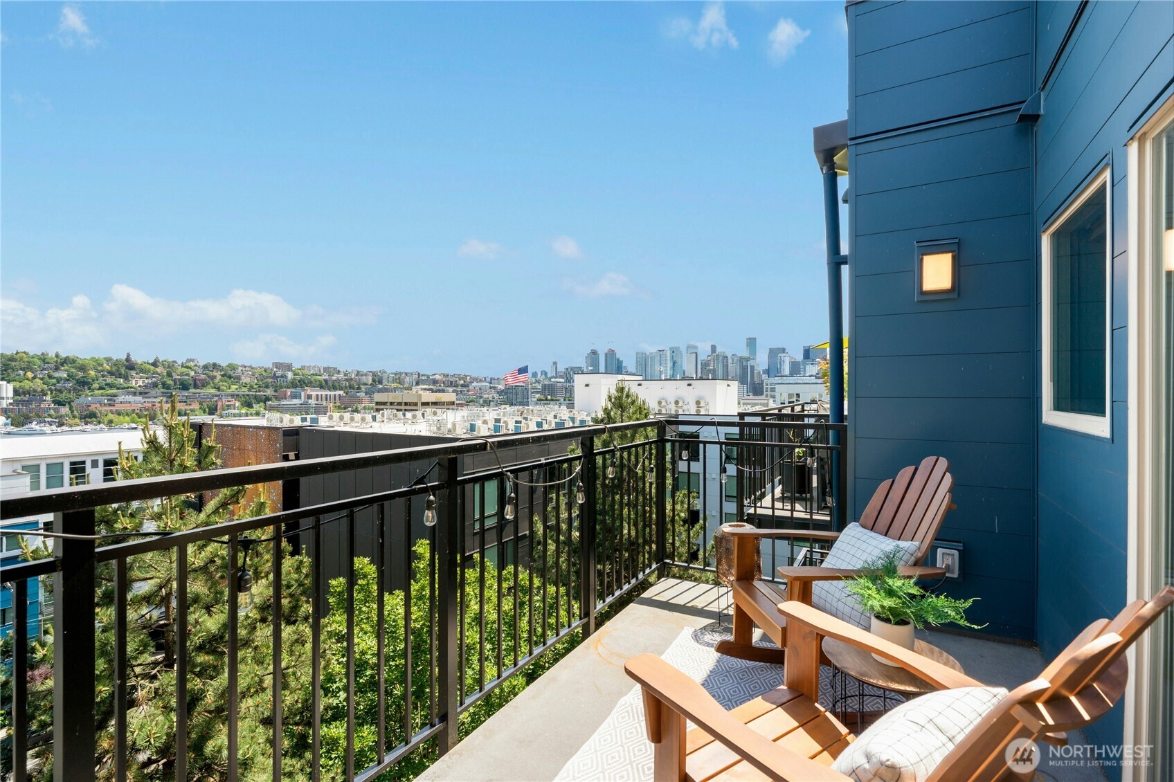 a view of a balcony with chairs