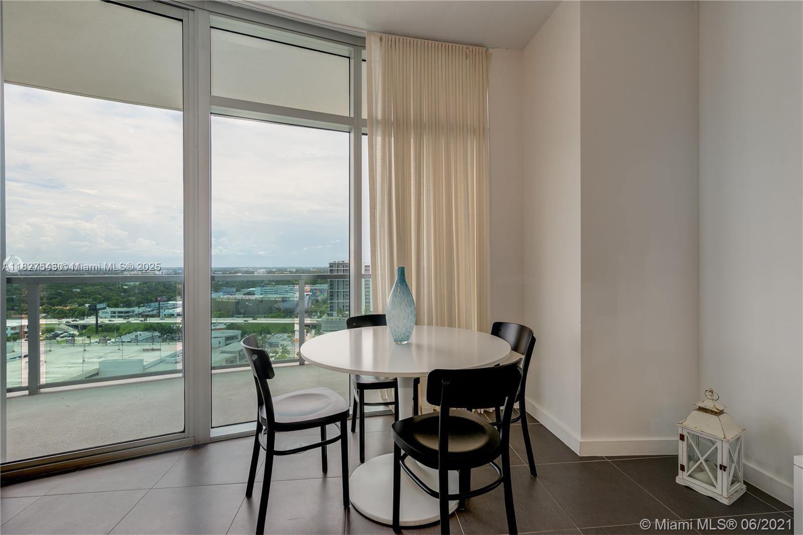 3301 Northeast 1st Avenue, Unit H2009 Miami, FL 33137 - Photo 14 of 45 a view of a workspace with a window