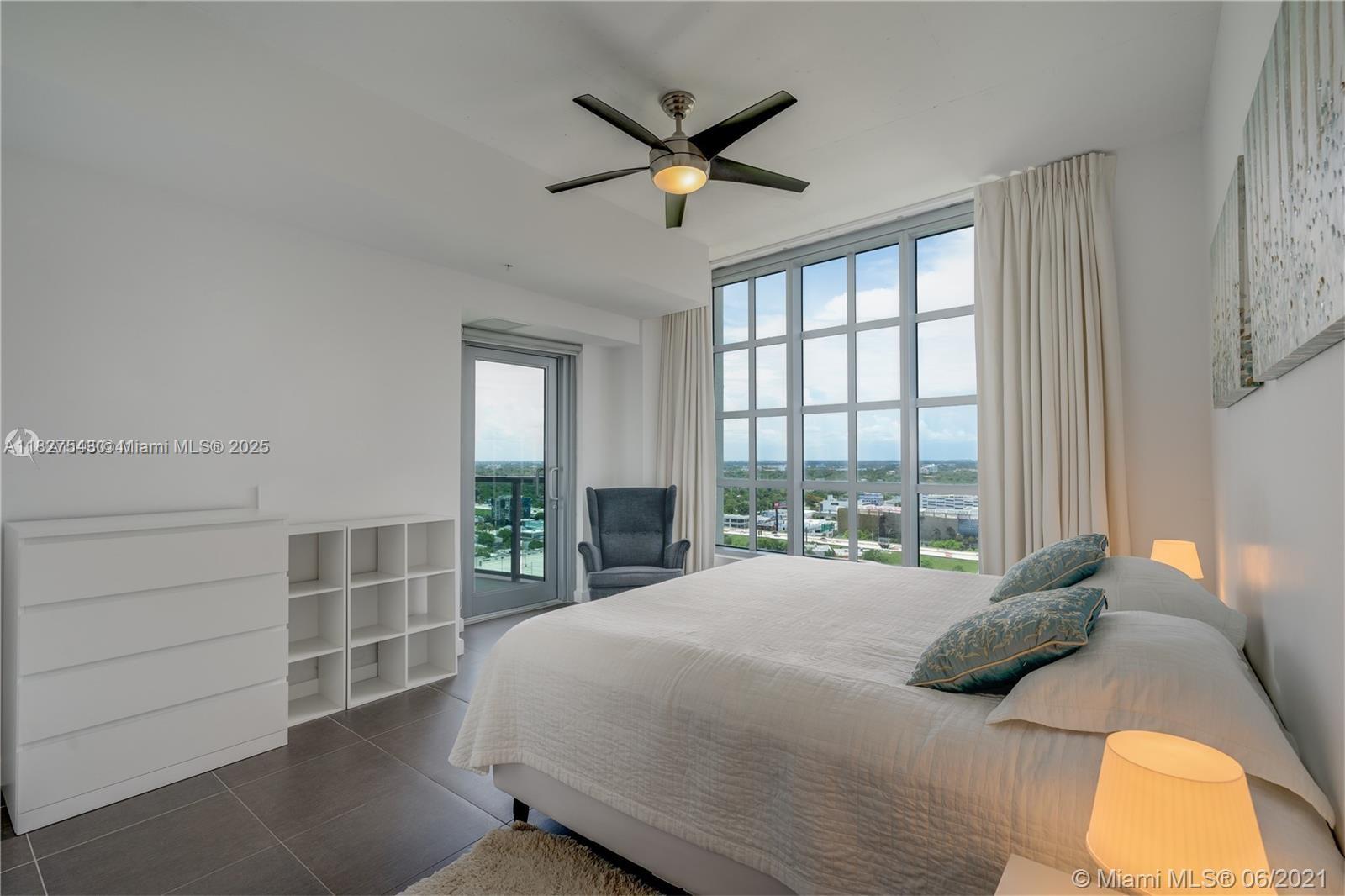 3301 Northeast 1st Avenue, Unit H2009 Miami, FL 33137 - Photo 15 of 45 a bedroom with a bed and window