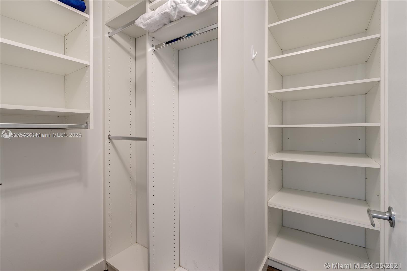 3301 Northeast 1st Avenue, Unit H2009 Miami, FL 33137 - Photo 18 of 45 a view of an empty walk in closet