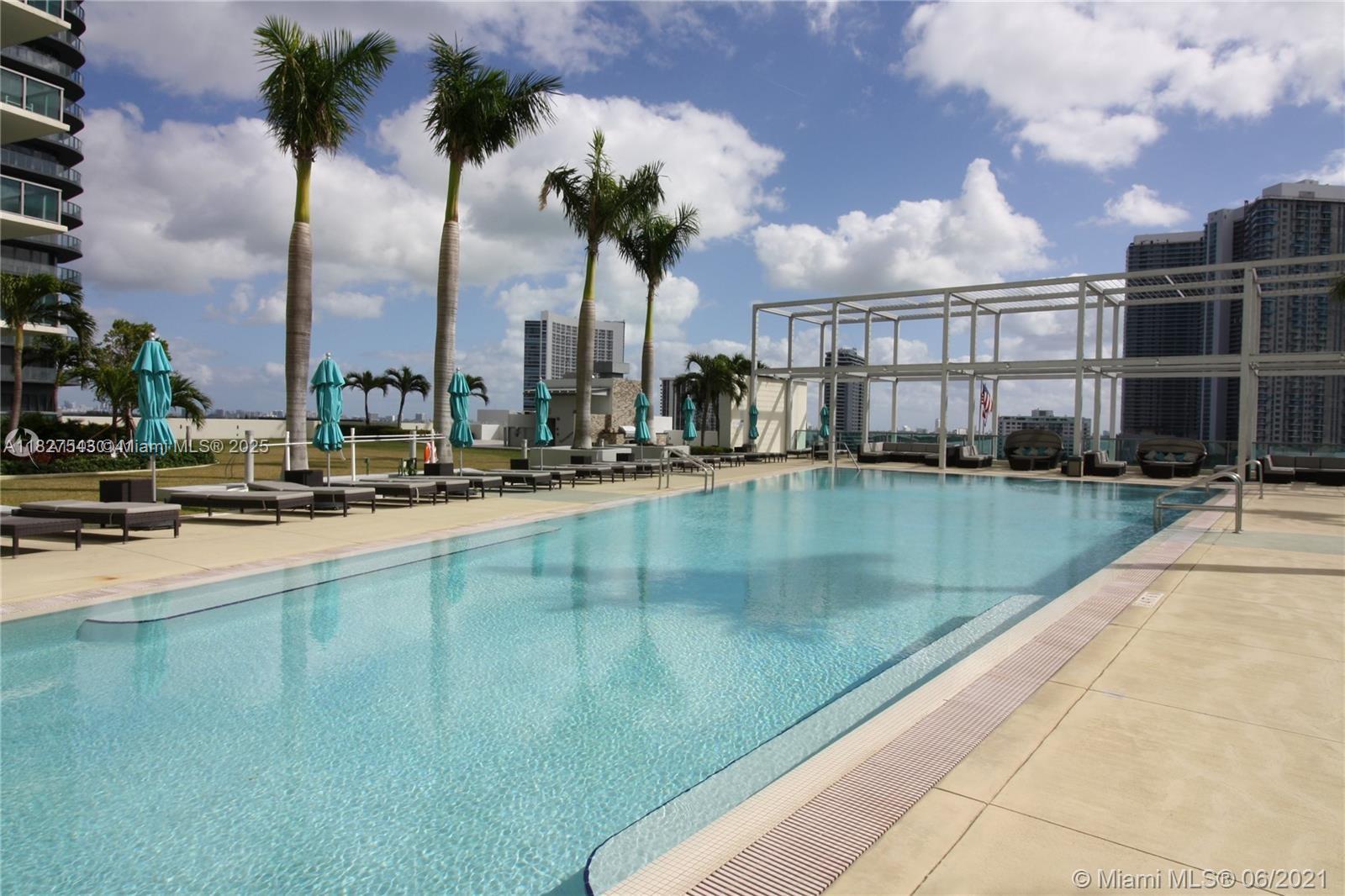 3301 Northeast 1st Avenue, Unit H2009 Miami, FL 33137 - Photo 34 of 45 a view of swimming pool with outdoor seating and yard