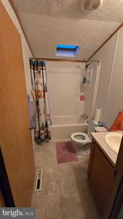 a bathroom with a sink and a shower