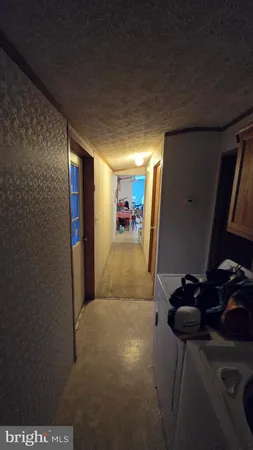 a view of hallway with workspace