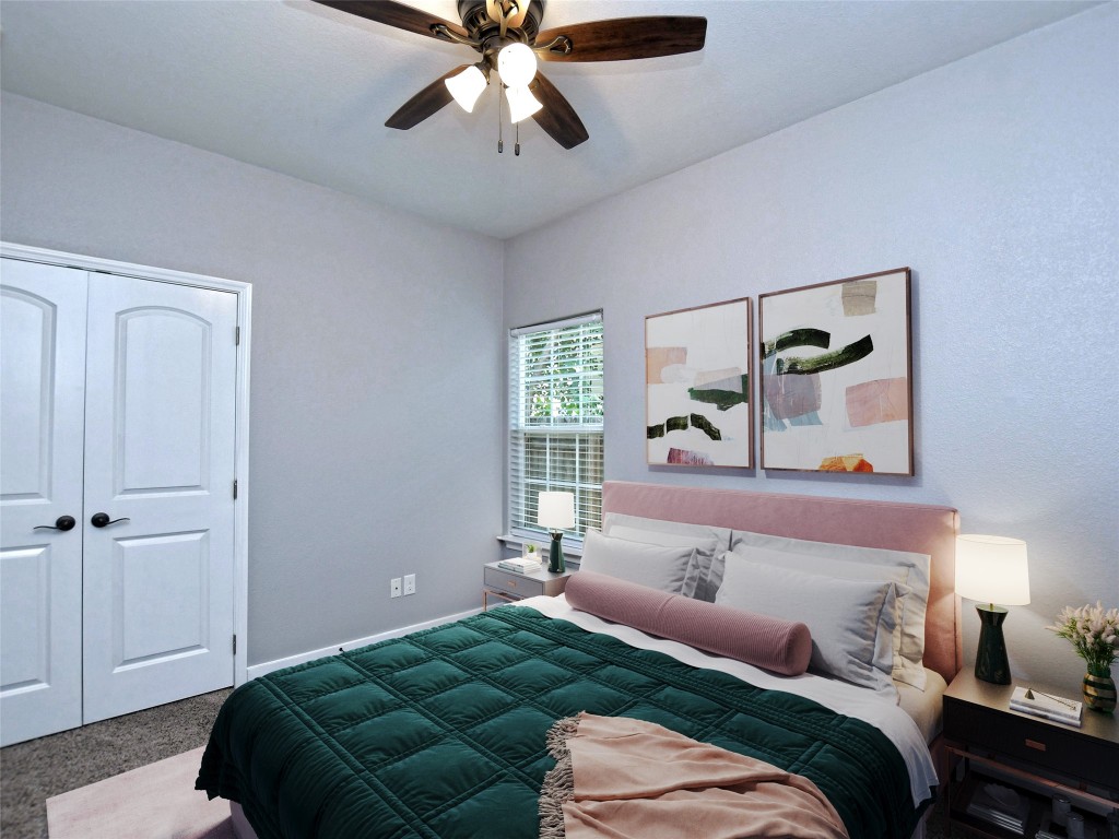 217 Geode Lane Jarrell, TX 76537 - Photo 29 of 35 Bedroom 3 with carpet flooring, a closet, and ceiling fan