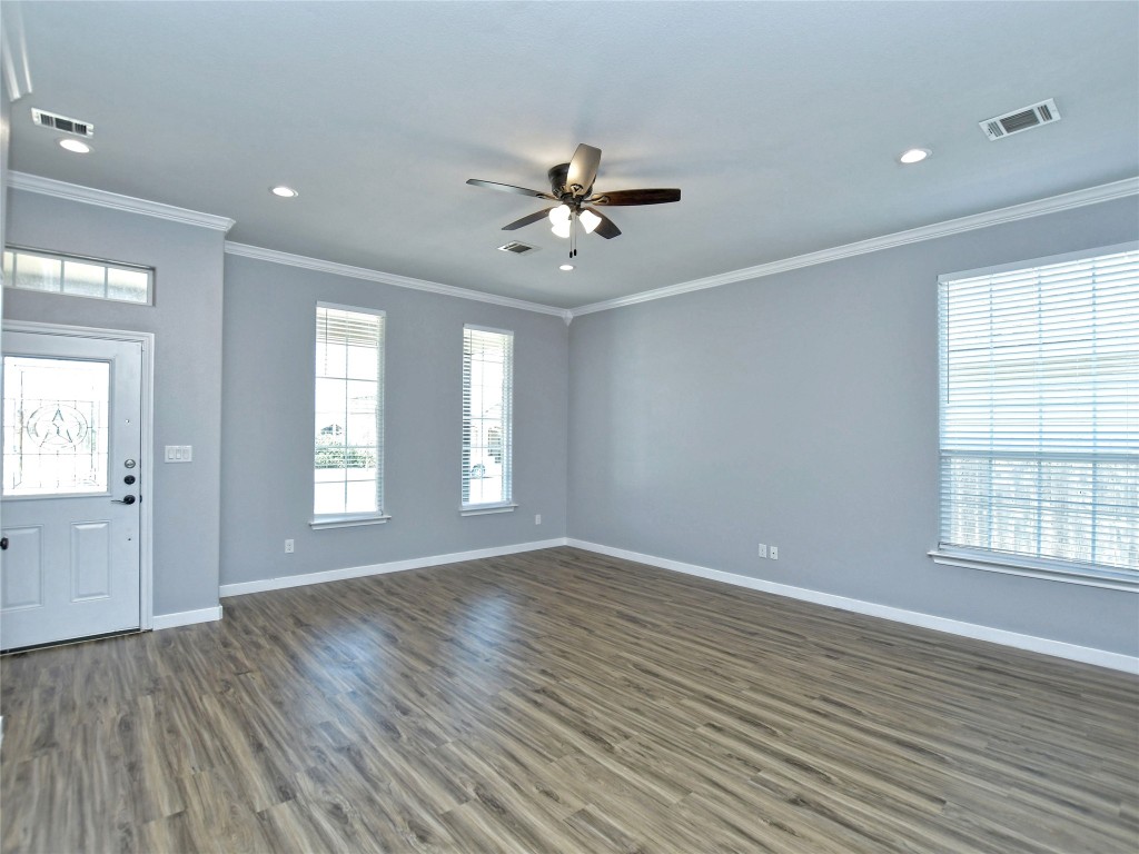 217 Geode Lane Jarrell, TX 76537 - Photo 5 of 35 Foyer with crown molding, dark wood-style flooring, a ceiling fan, and recessed lighting