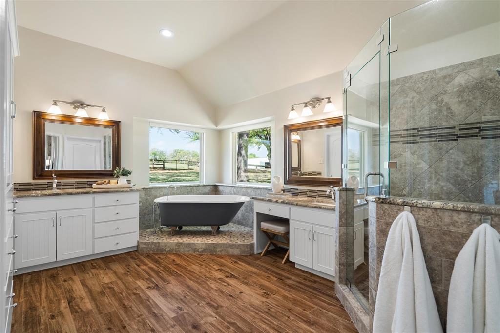 2431 Dr Sanders Road Cross Roads, TX 76227 - Photo 19 of 40 a kitchen with a sink stove and refrigerator