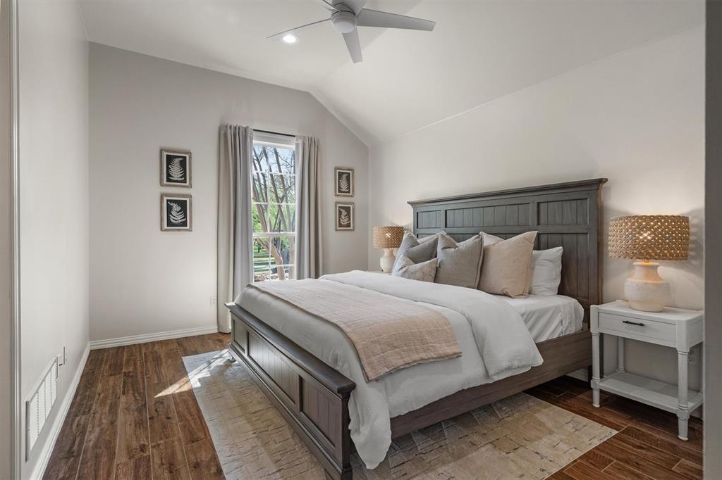 2431 Dr Sanders Road Cross Roads, TX 76227 - Photo 20 of 40 a bedroom with bed and a window