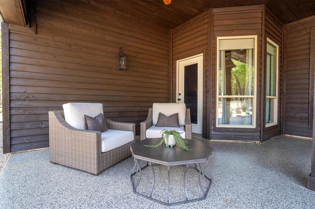 2431 Dr Sanders Road Cross Roads, TX 76227 - Photo 27 of 40 a living room with furniture