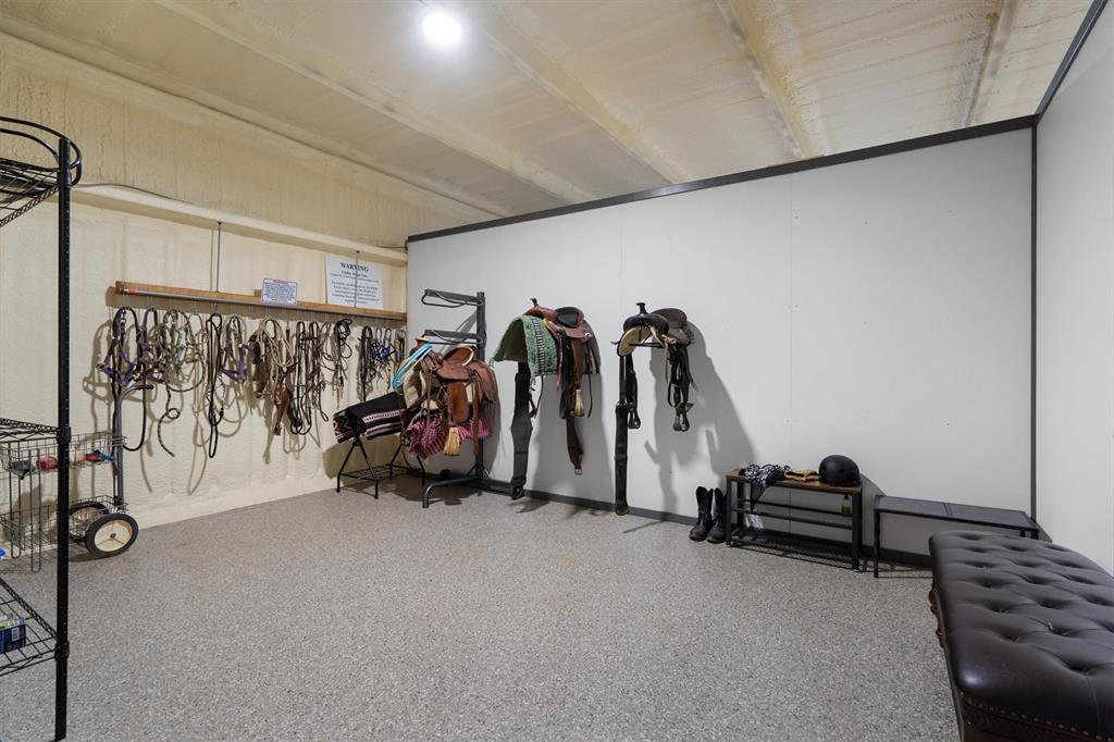 2431 Dr Sanders Road Cross Roads, TX 76227 - Photo 36 of 40 a view of a room with gym equipment