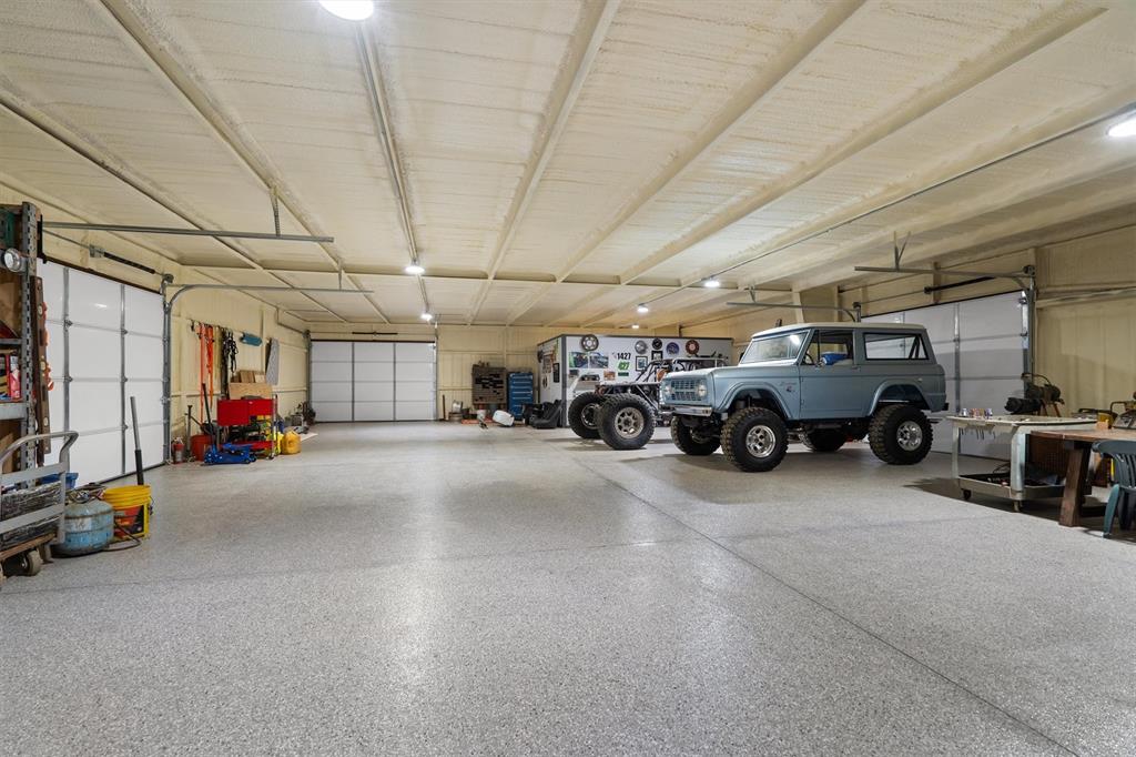 2431 Dr Sanders Road Cross Roads, TX 76227 - Photo 40 of 40 a view of parking space with parked cars