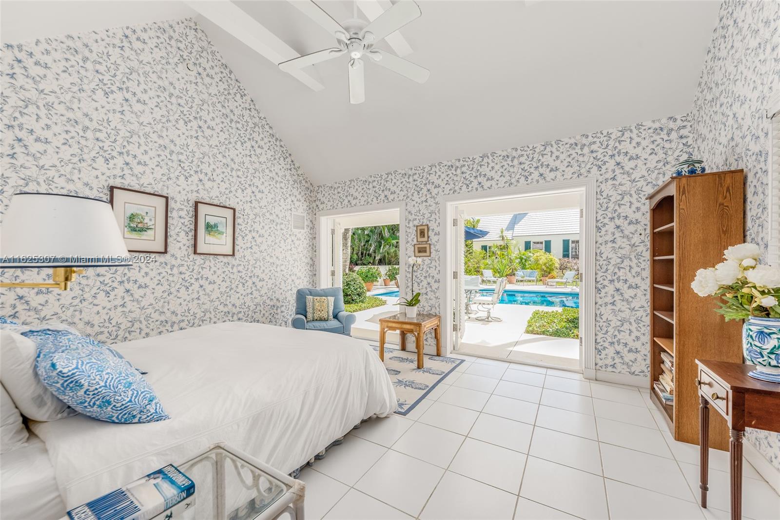43 North Beach Road Jupiter Island, FL 33455 - Photo 21 of 34 a bedroom with a bed and a window