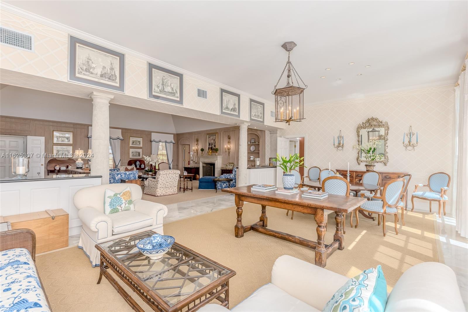 43 North Beach Road Jupiter Island, FL 33455 - Photo 10 of 34 a living room with furniture and a chandelier