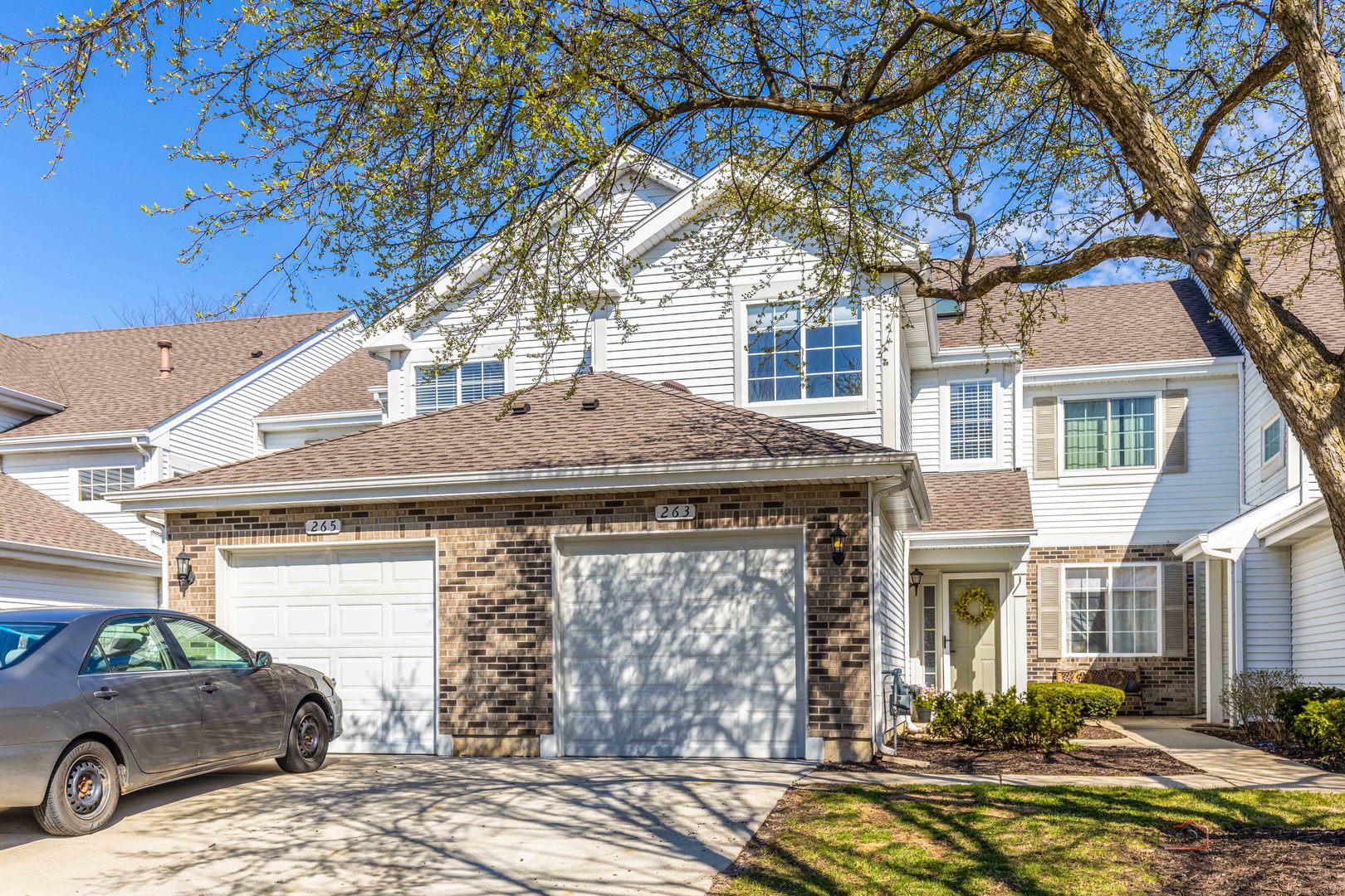263 Camel Bend Court Schaumburg, IL 60107 - Photo 1 of 24 a view of a car park in front of a house