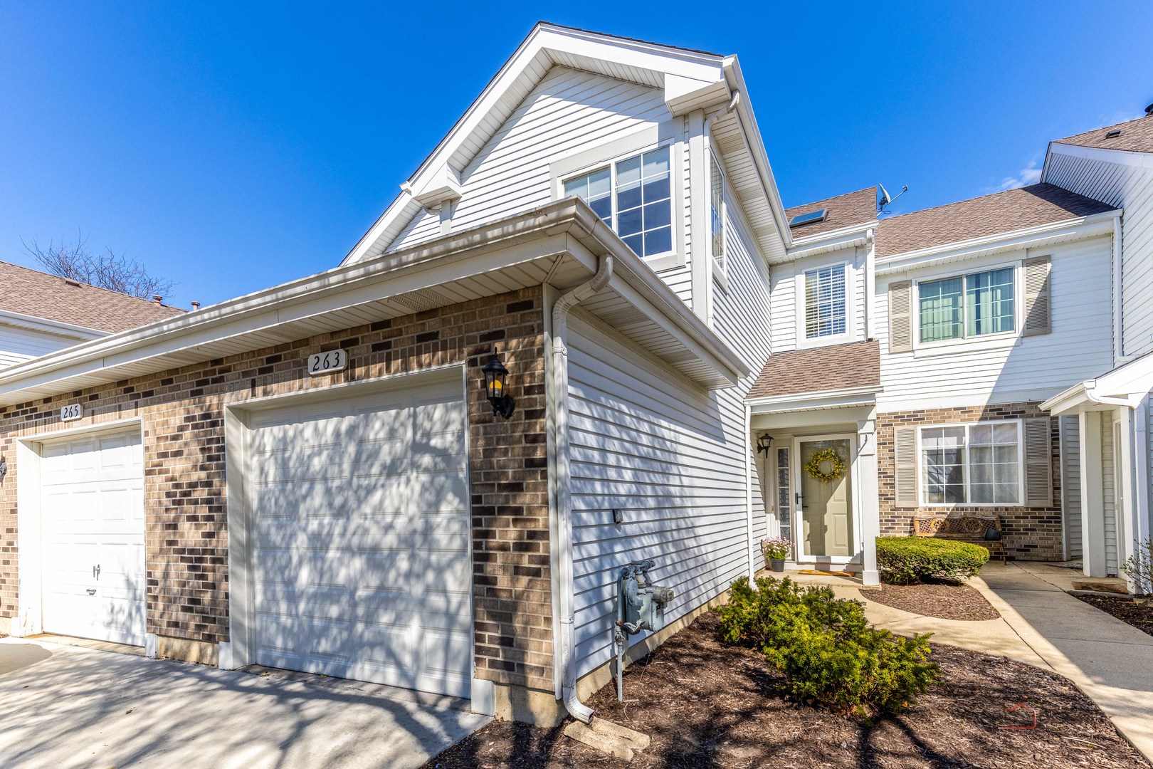 263 Camel Bend Court Schaumburg, IL 60107 - Photo 2 of 24 a view of a house with a patio