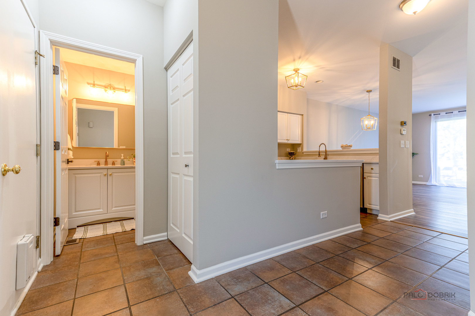 263 Camel Bend Court Schaumburg, IL 60107 - Photo 5 of 24 a view of a kitchen with a refrigerator and a sink