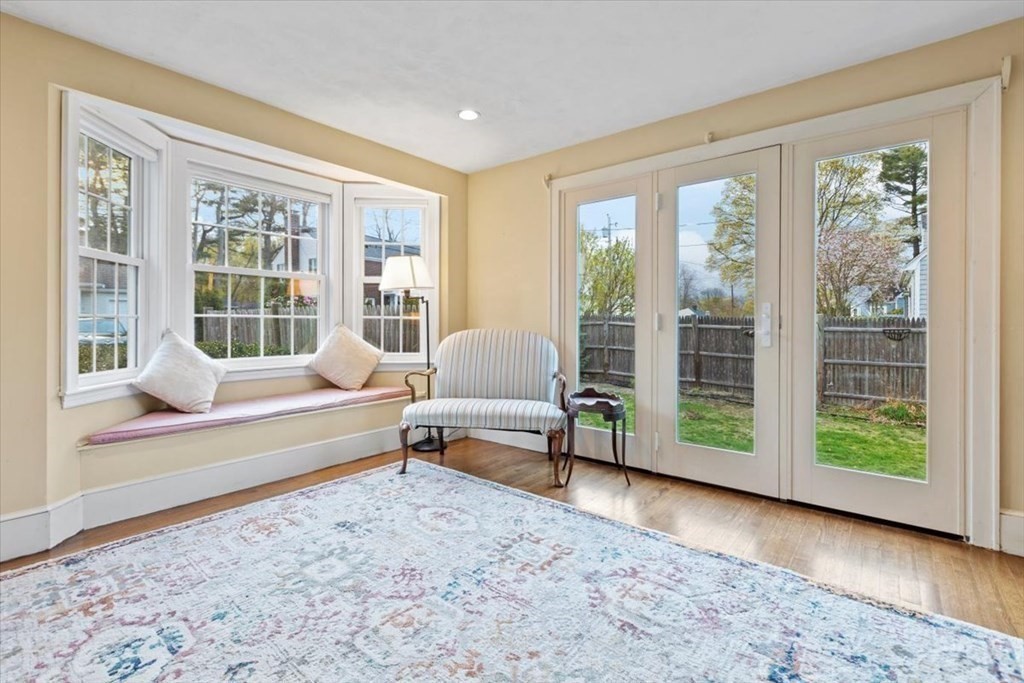54 Ober Street Beverly, MA 01915 - Photo 11 of 40 a living room with furniture and a large window