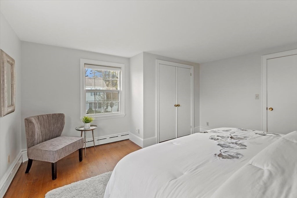 54 Ober Street Beverly, MA 01915 - Photo 22 of 40 a bedroom with a bed and a couch