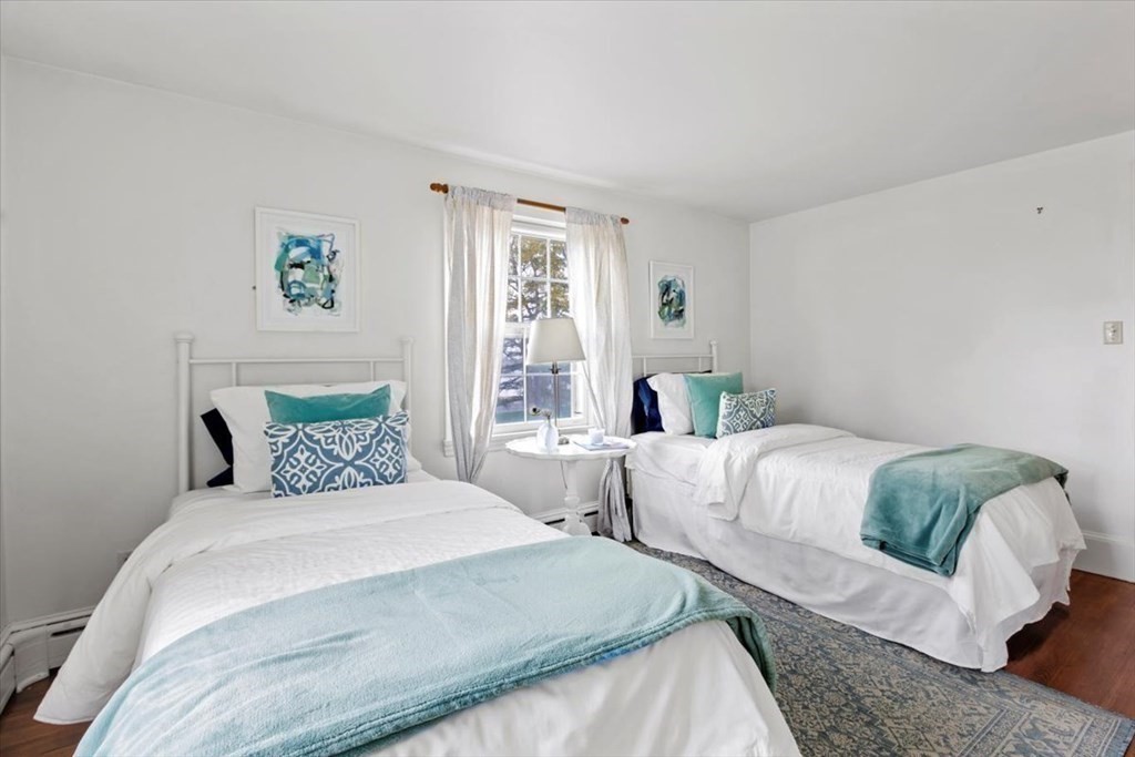 54 Ober Street Beverly, MA 01915 - Photo 29 of 40 a bedroom with two beds and a window