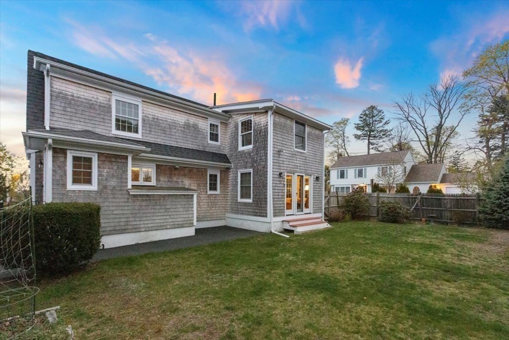 54 Ober Street Beverly, MA 01915 - Photo 34 of 40 a front view of a house with a yard