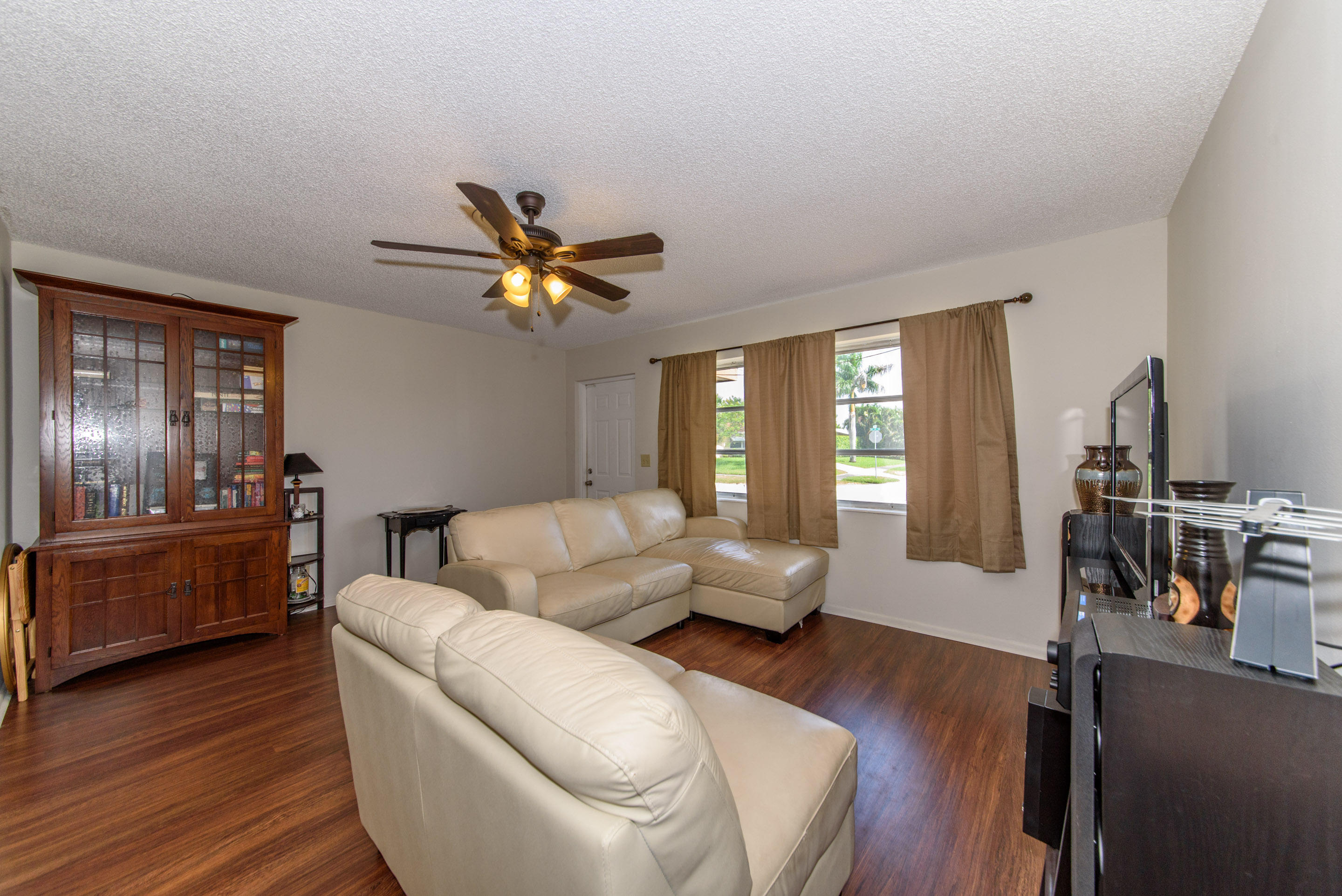 700 Southwest 14th Street Deerfield Beach, FL 33441 - Photo 6 of 13 a living room with furniture and wooden floor