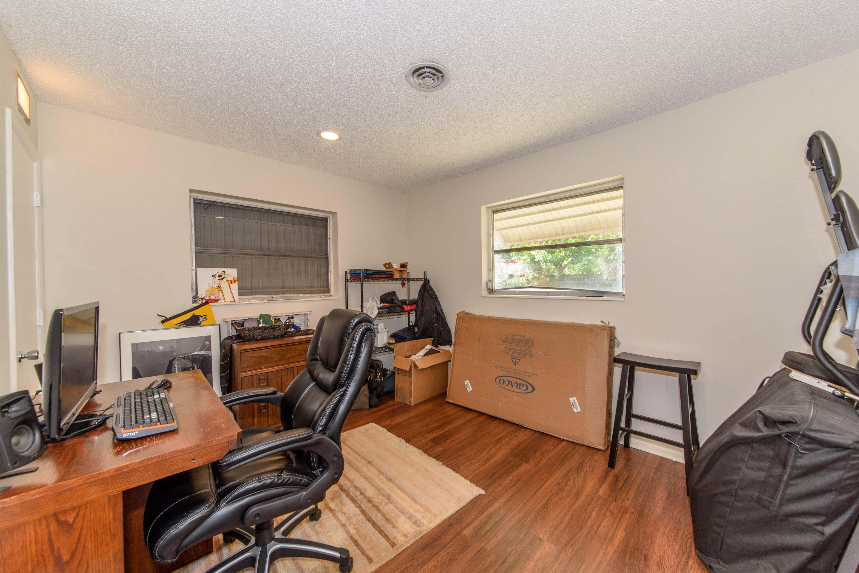 700 Southwest 14th Street Deerfield Beach, FL 33441 - Photo 9 of 13 a view of a workspace with furniture and a window