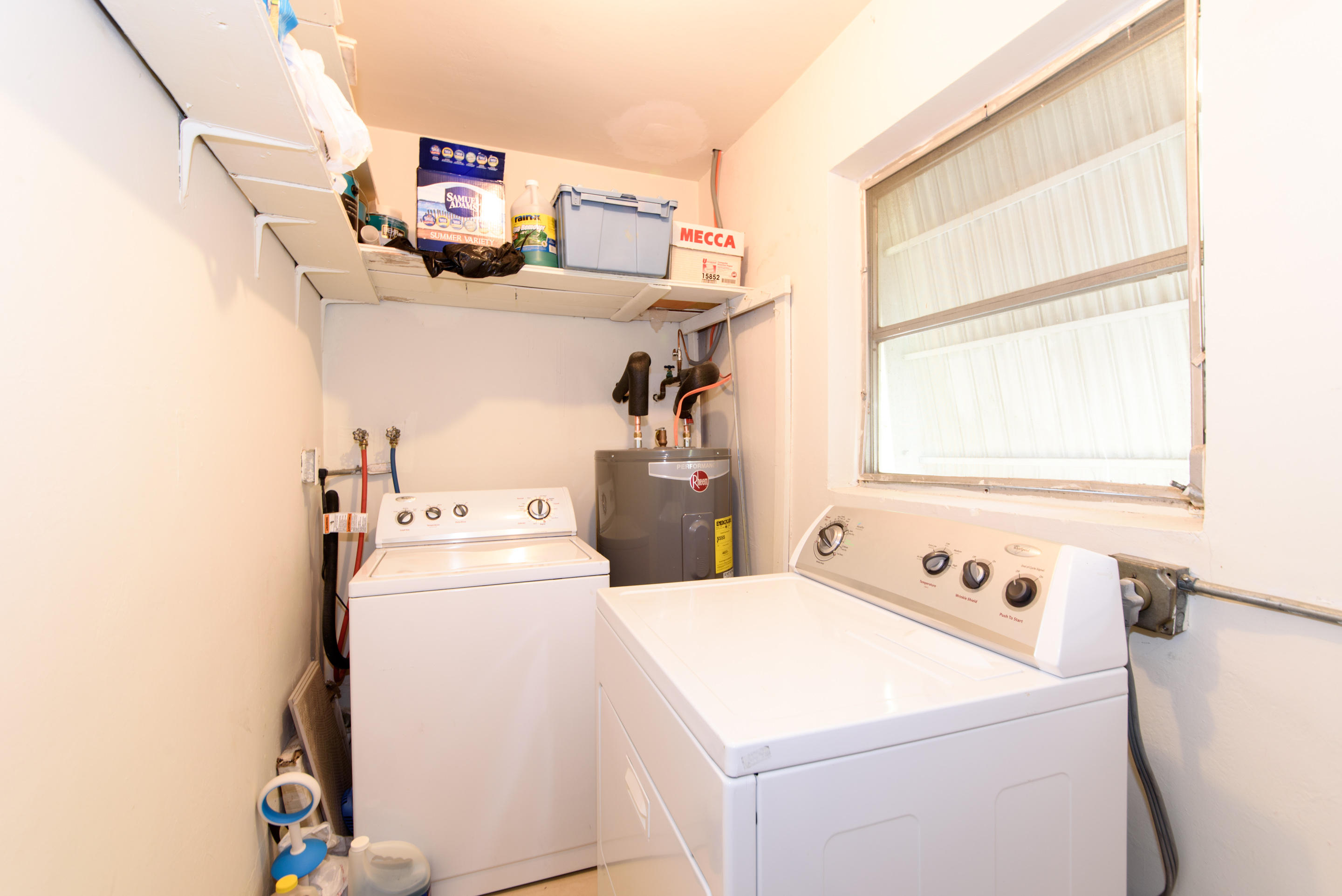 700 Southwest 14th Street Deerfield Beach, FL 33441 - Photo 10 of 13 a utility room with dryer and washer
