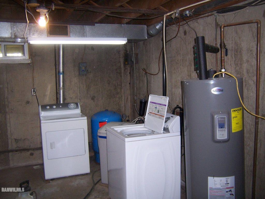 8030 South Gamble Hill Road Hanover, IL 61041 - Photo 8 of 15 a utility room with dryer and washer