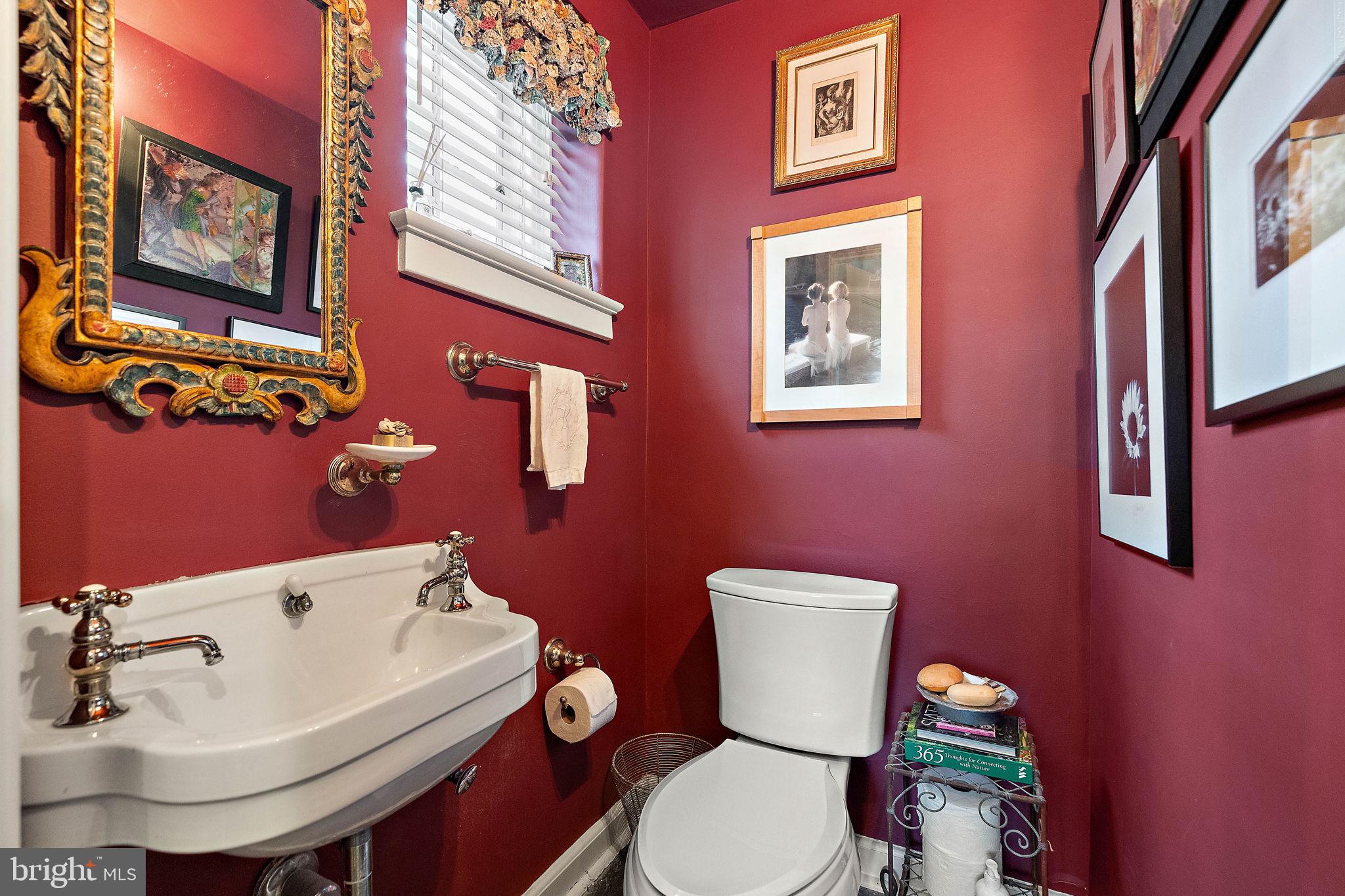 912 Nottingham Road Wilmington, DE 19805 - Photo 20 of 49 a white toilet sitting next to a bathroom sink