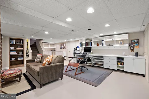 a living room with furniture and a table