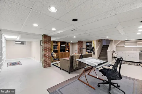 a view of a livingroom with furniture and a couch