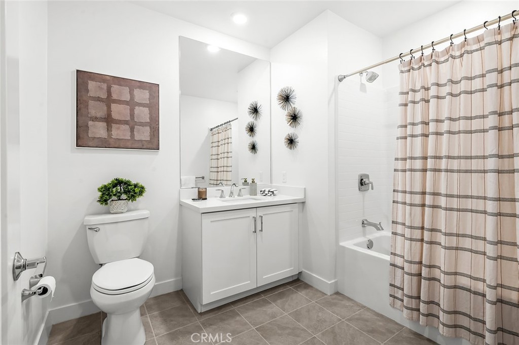3604 Rivington Irvine, CA 92612 - Photo 16 of 54 a bathroom with a sink toilet and shower