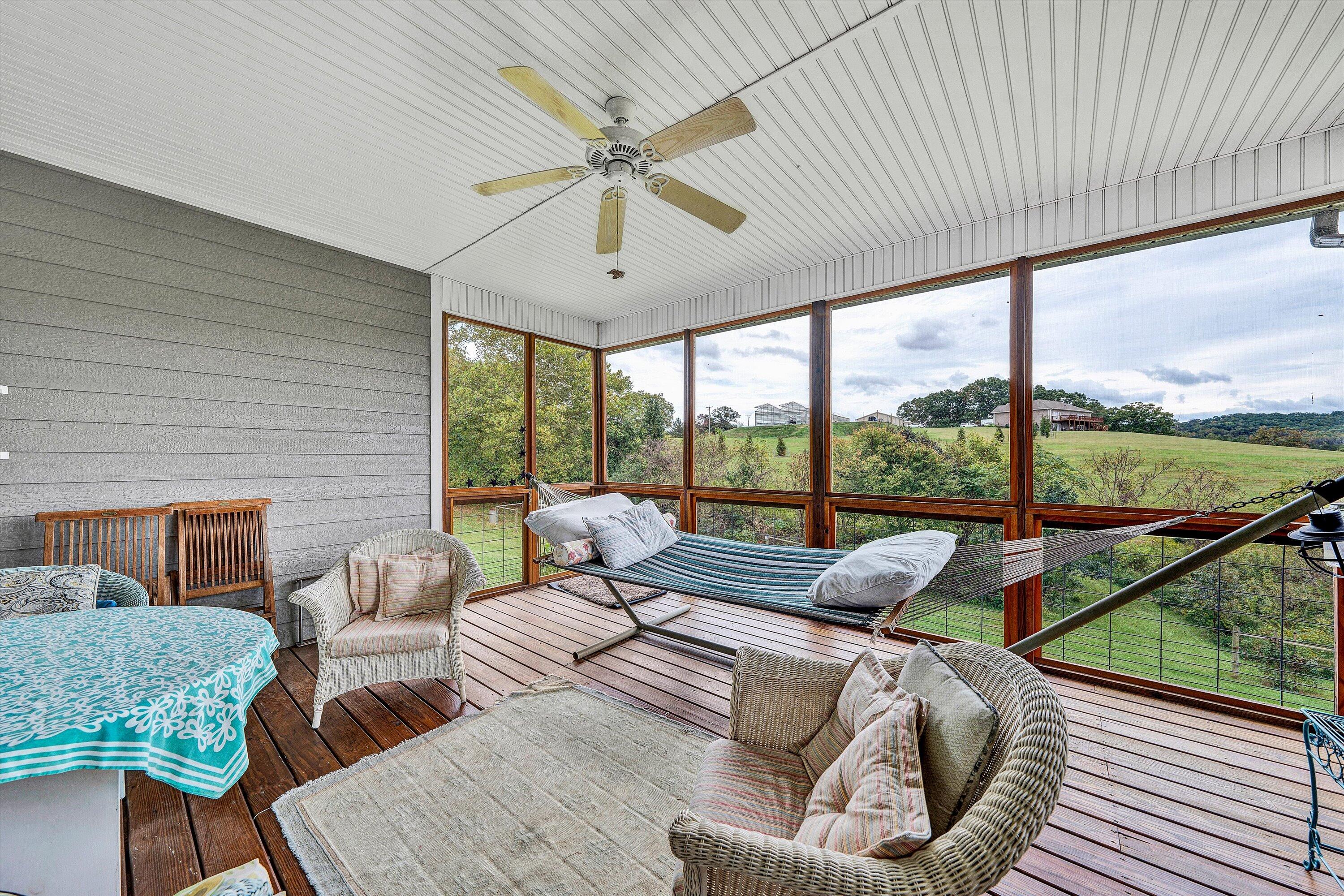 84 Green Level Road Boones Mill, VA 24065 - Photo 28 of 57 a living room with furniture and a large window