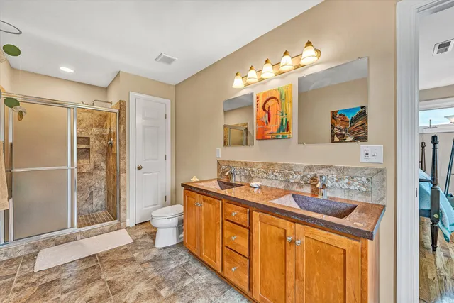 an aerial view of a house with mountain view