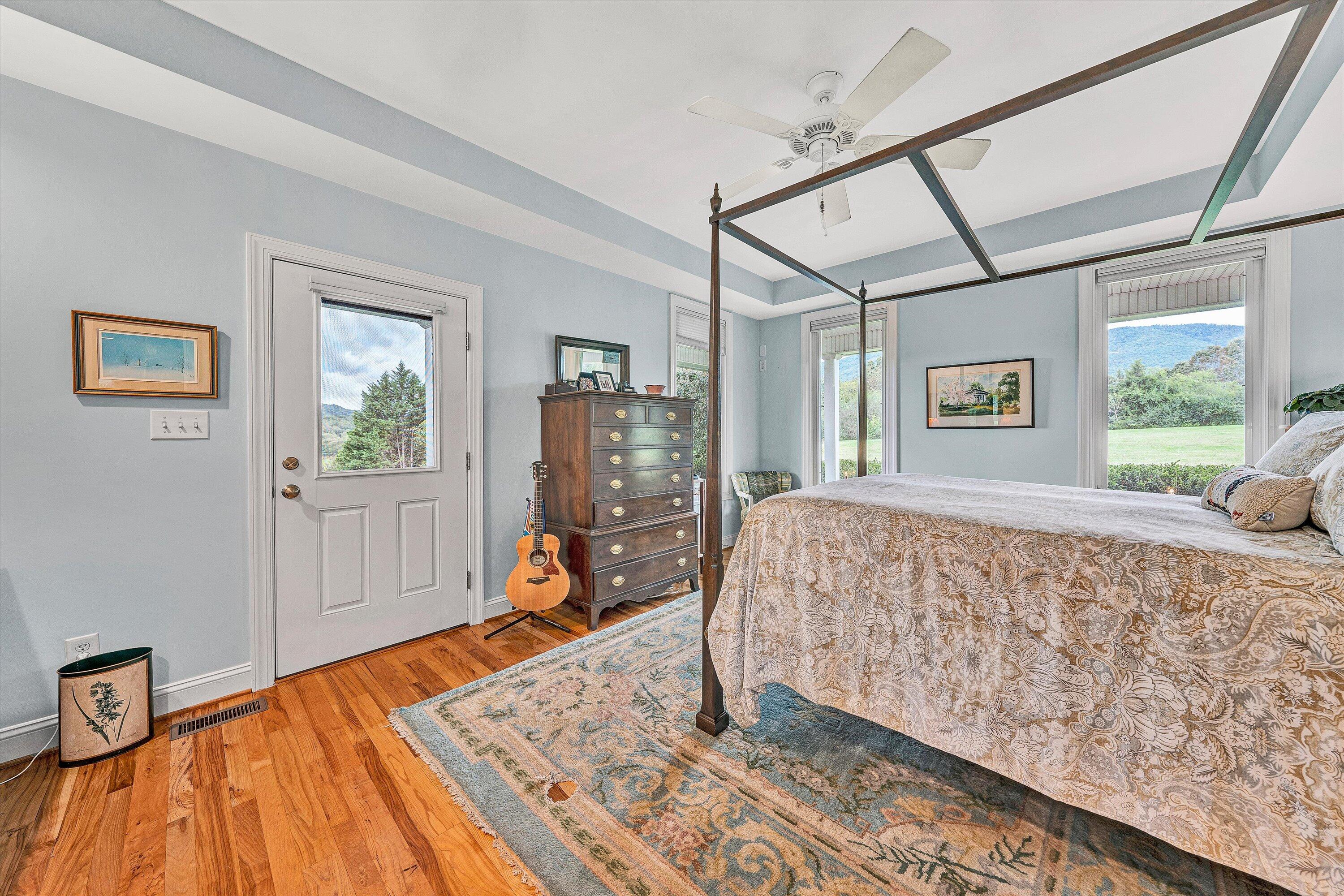 84 Green Level Road Boones Mill, VA 24065 - Photo 33 of 57 a bed sitting in a spacious bedroom next to a window